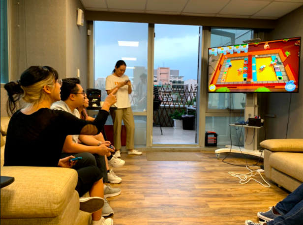 Taroko team members playing Overcooked on Nintendo Switch